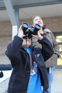 Learning how to use binoculars.